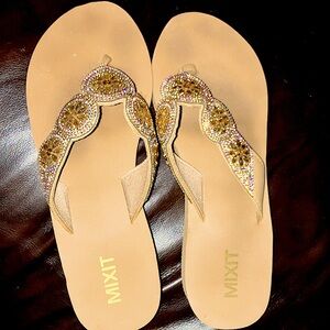 Mixit branded flip flops with jewel detailing. Size 9. Never been worn.
